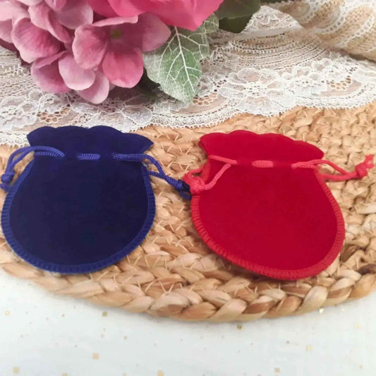 Médaillon pour bouquet de mariée avec perle et ruban.